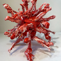 Beached – Cast driftwood and objects in jesmonite and red acrylic – Sculptor and Artist Sally de Courcy